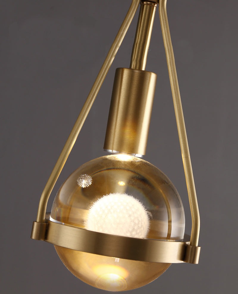 Shiny LED Glass Raindrop Wall Light with Brushed Brass Frame in Modern &amp; Contemporary Style Close up