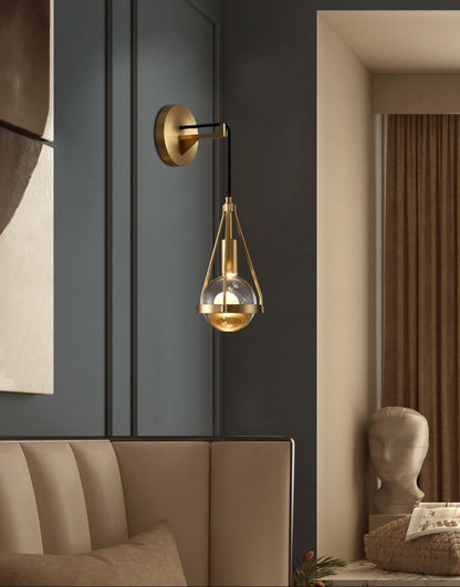 Shiny LED Glass Raindrop Wall Light with Brushed Brass Frame in Modern &amp; Contemporary Style in Art Deco Living Space