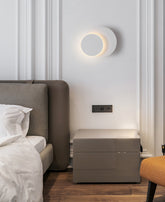 White Geometric LED Wall Light in Scandinavian Style Round in Scandi Bedroom